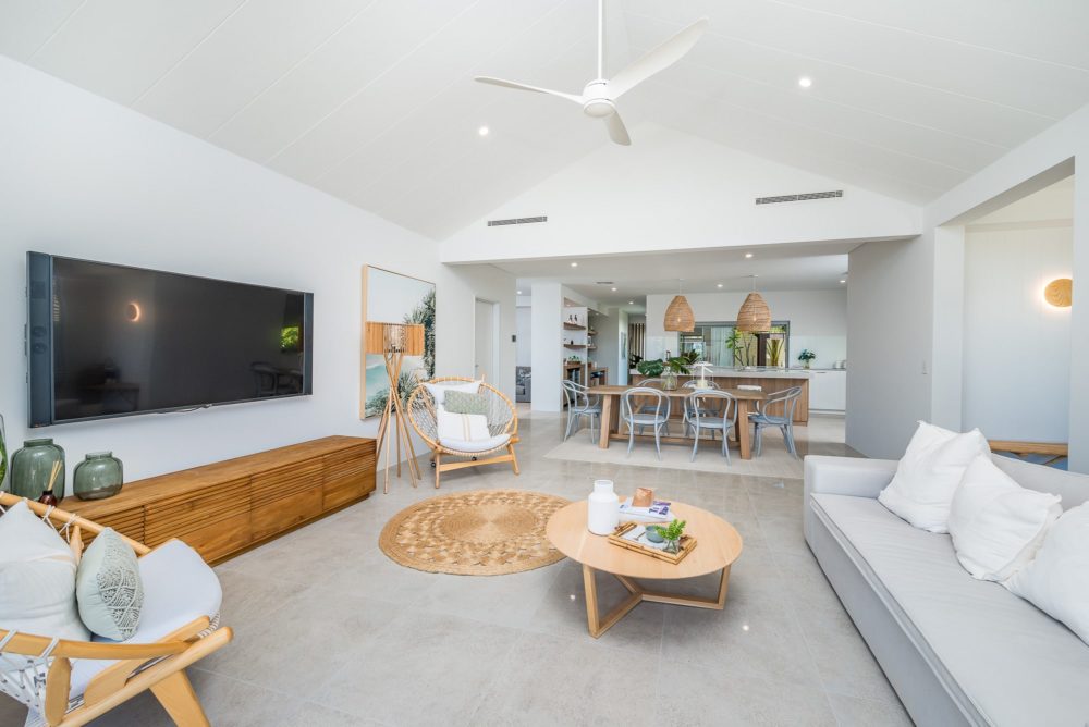 Living area of house with high ceilings.