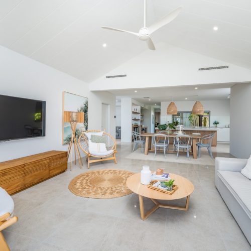 Living area of house with high ceilings.