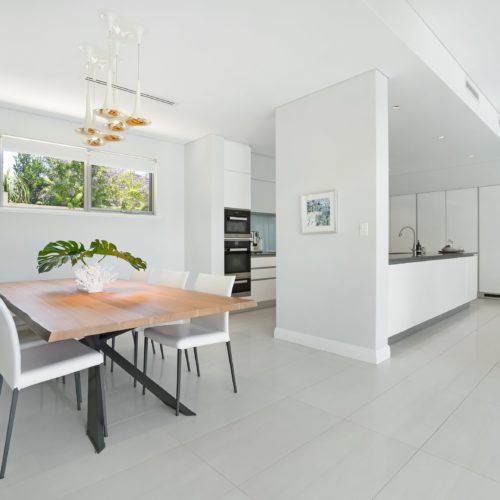 Dining area and part of a kitchen.