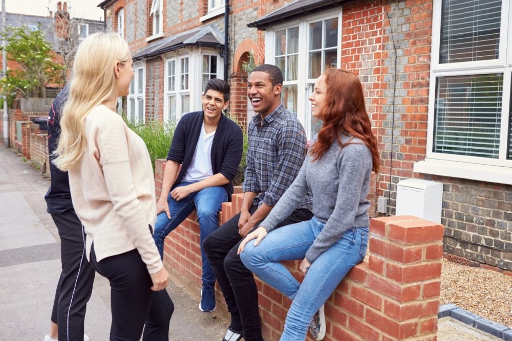 Neighbours talking outside.